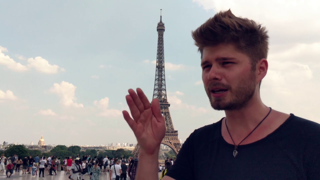 Selbstbewusst flirten: Ziel, Gewohnheit und Komfortzone 1 Marko Mitrovic vor dem Eiffelturm in Paris erklärt, wie du selbstbewusst flirten lernst